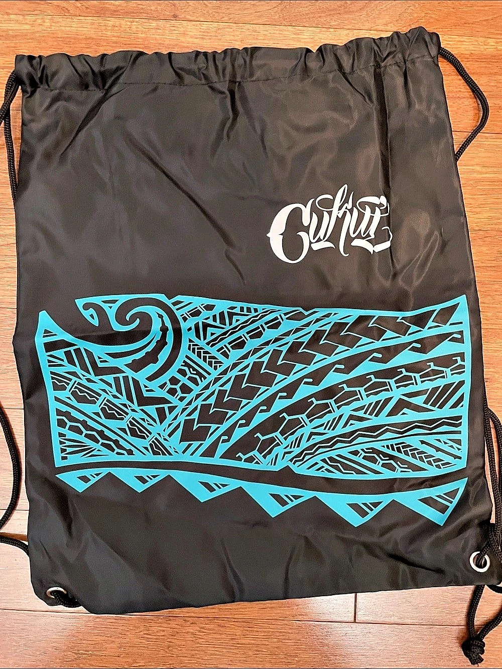 Cukui Island Tribal Design - Drawstring Backpack in Black & Turquoise Blue